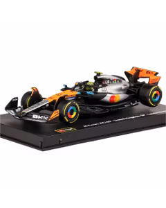 Macheta Formula 1 McLaren MCL39 Team McLaren No.4 World Champion Winner British GP Silverstone 2025 Lando Norris Orange Chrome Black cu Pilot si Vitrina 1:43 Burago