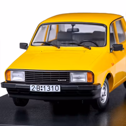 Macheta auto Dacia 1310 L 1993 galben 1:18 Triple 9