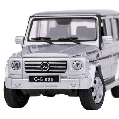 Macheta auto Mercedes-Benz G Class 2009 scara 1:24 argintiu Welly