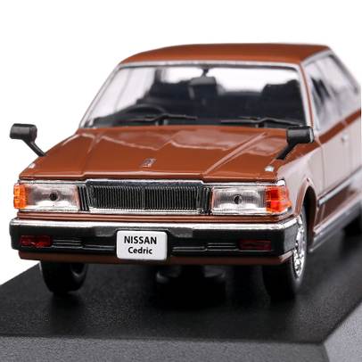 Macheta auto Nissan Cedric 430 1979 scara 1:43 maro Norev