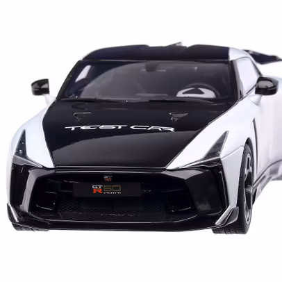 Macheta auto Nissan GT-R 50 test car 2021, scara 1:18, alb cu negru, GT Spirit