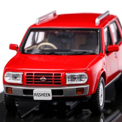 Macheta auto Nissan Rasheen Type I 1996 scara 1:43 rosu Norev
