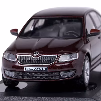 Machetă Skoda Octavia III 2012 Rosso Brunello metalizat (vișiniu), scara 1:43 - vedere din fata close up