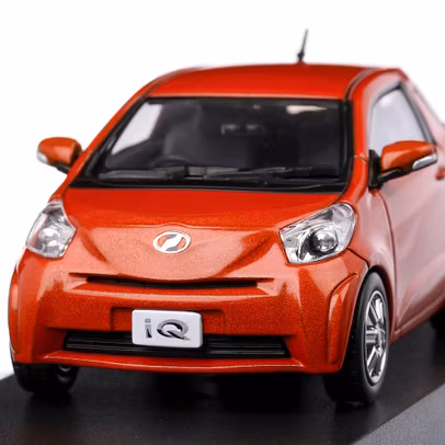 Macheta auto Toyota IQ 2009 scara 1:43 portocaliu J Collection