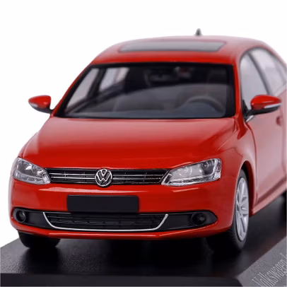 Macheta auto Volkswagen Jetta 2010 rosu 1-43 Minichamps