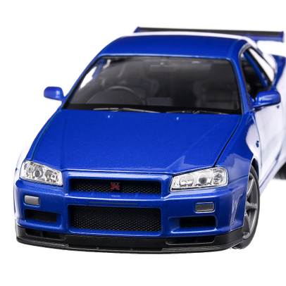 Macheta auto Nissan Skyline GT-R  R34 2000 scara 1:24 albastru metalizat Welly