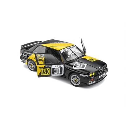 BMW E30 M3 DTM #31 1988, macheta auto scara 118, negru cu galben, Solido