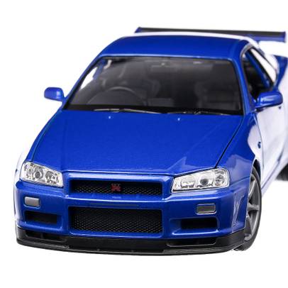 Macheta auto Nissan Skyline GT-R R34 2000 scara 1:24 albastru metalizat Welly