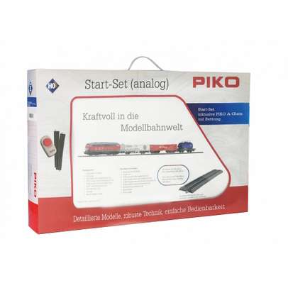 Set tren electric marfa PIKO HO 57154 cu sina cu terasament, locomotiva si vagoane - ambalaj original
